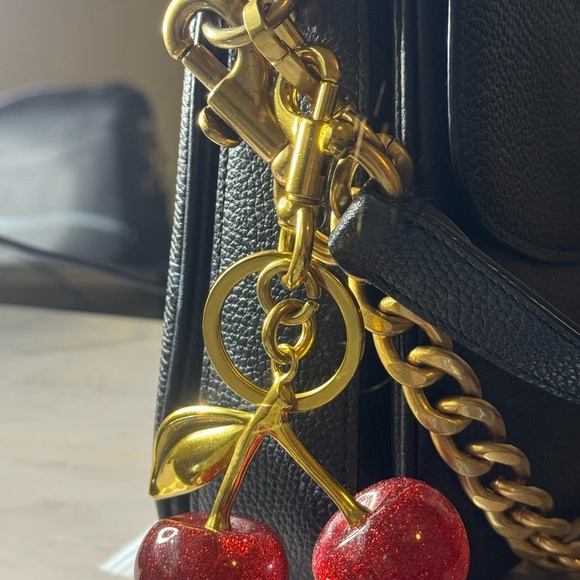 Coach Cassie Top Handle Black Pebbled Leather
Convertible Bag - Picture 5 of 16